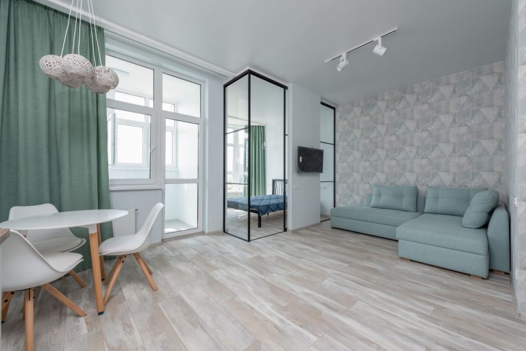 Light wood-look laminate flooring in a bright Minnesota apartment