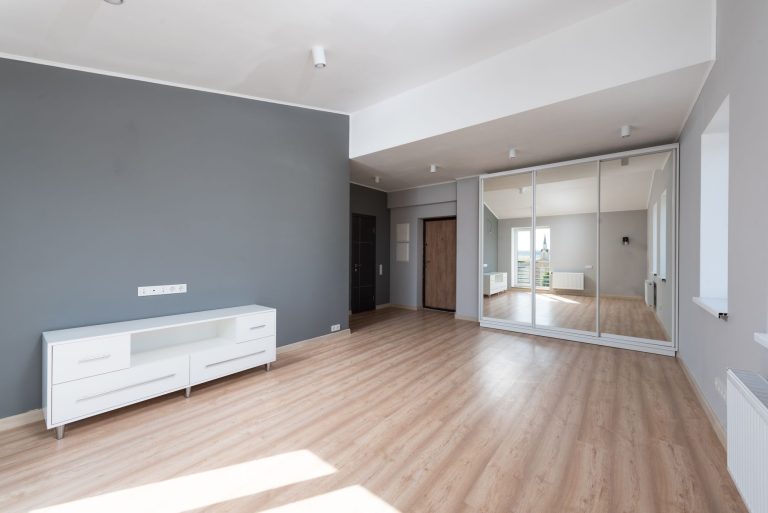 Luxury vinyl plank flooring in an empty Minnesota room