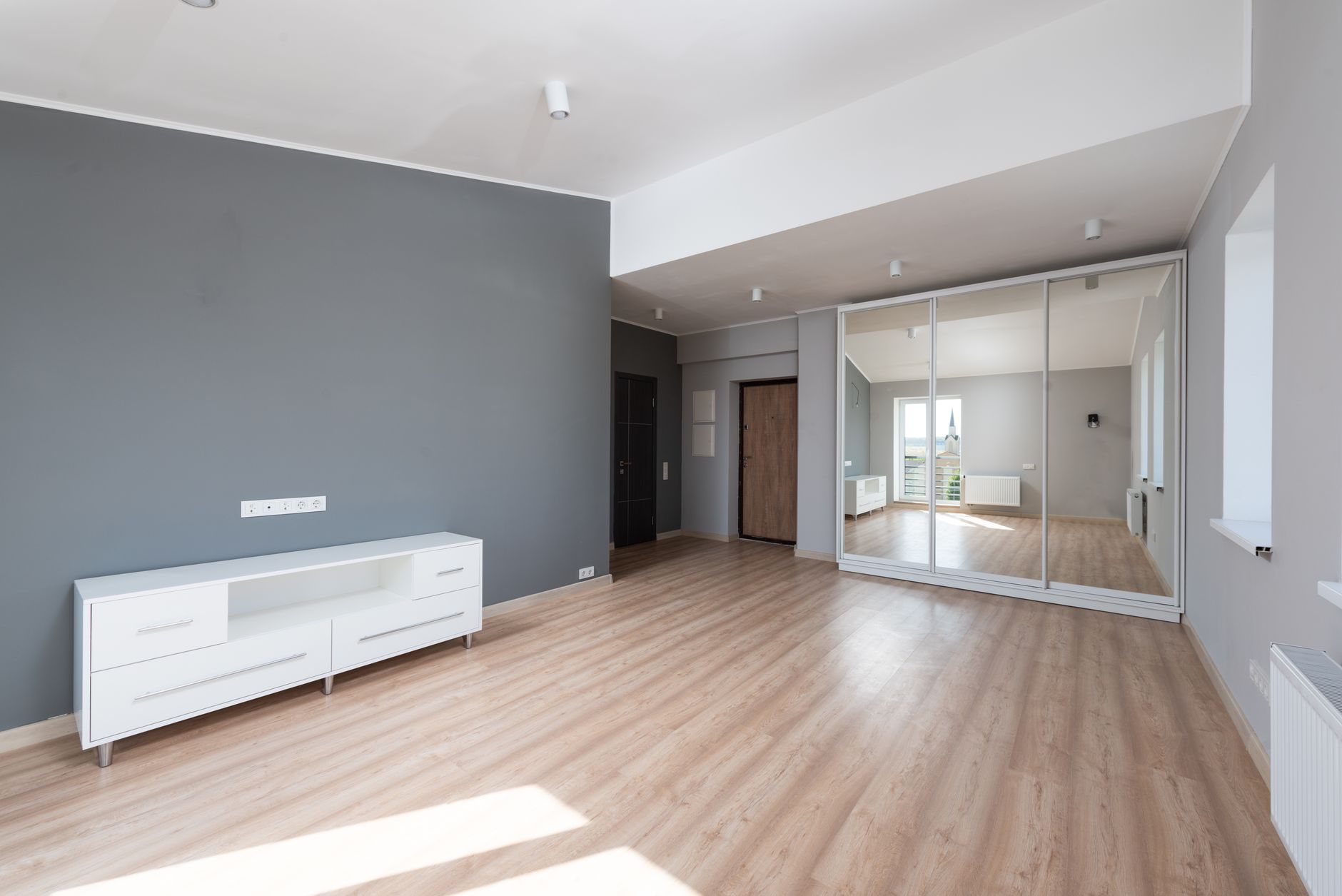Luxury vinyl plank flooring in an empty Minnesota room
